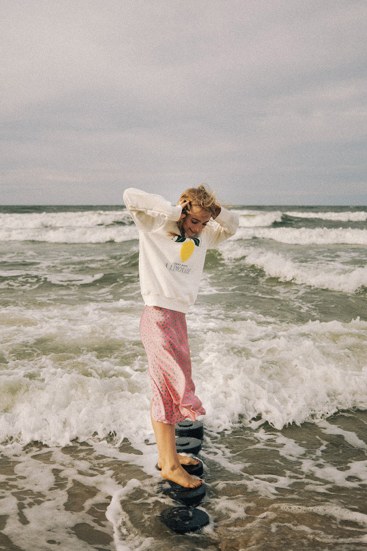 Fließender Midi-Rock in Pink mit grünen Punkten