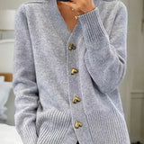Monika – Strickjacke mit Herzknöpfen