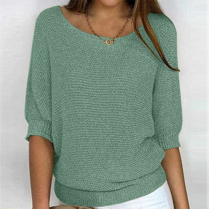 Grüner Fledermaus-Strickpullover