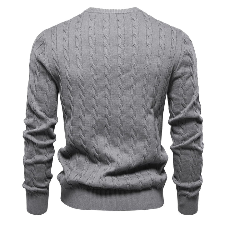 Marineblauer Zopfstrickpullover mit rotem Logo-Detail