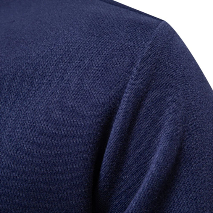 Dunkelblaues Langarm-Poloshirt mit weißem Kontrastkragen