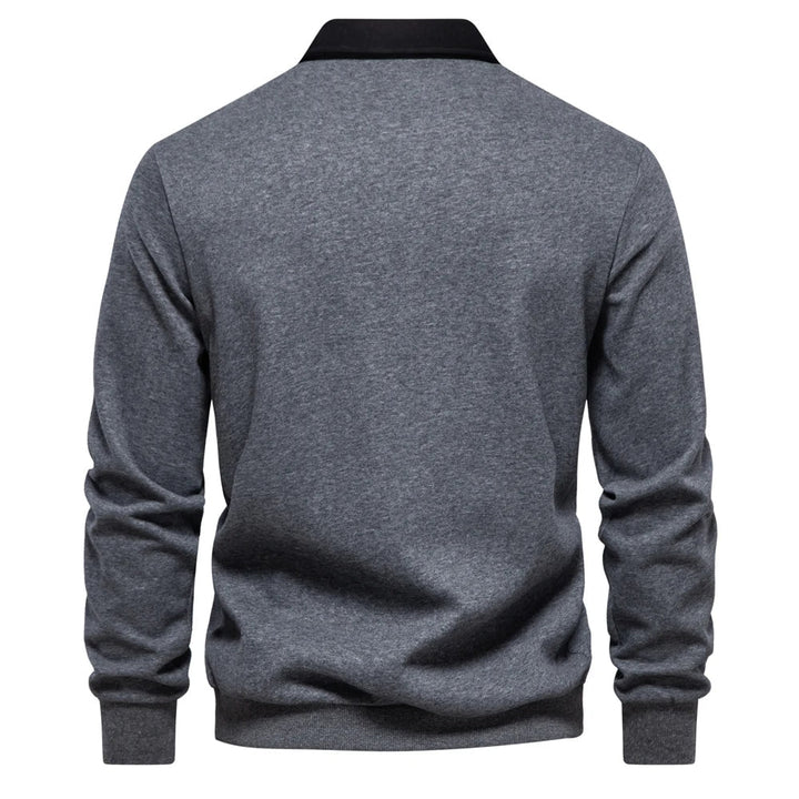 Dunkelblaues Langarm-Poloshirt mit weißem Kontrastkragen