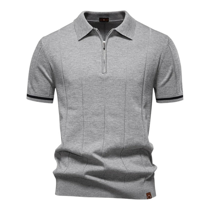 Dunkelblaues Strick-Poloshirt mit Reißverschluss und Kontraststreifen